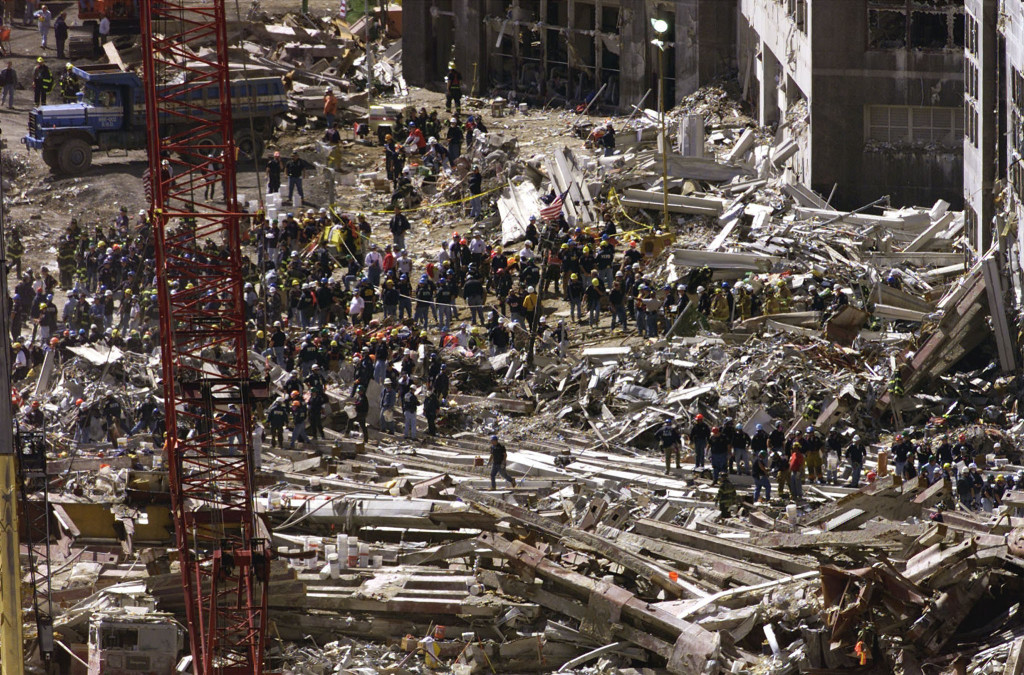 Rescue workers continue their search for survivors on the rubble of the destroyed World Trade Center in New York, September 15, 2001. (Photo: REUTERS/Jeff Christensen/Newscom).