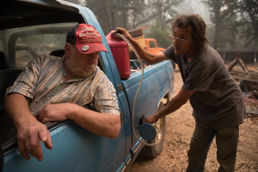 Norman Gussell fills Steven Van Jones’ tank up with gas in Jackson, Calif. Gov. Jerry Brown declared a state of emergency Friday afternoon in Calaveras and Amador Counties as many attempt to evacuate. (Photo: Andrew Seng/Newscom)