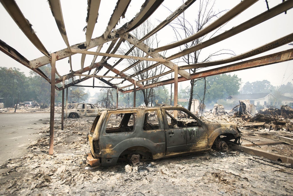 Many vehicles, including this one were completely destroyed by a fast-moving blaze Saturday night while parked at an apartment complex in Middletown on Sunday. (Photo: Randy Pench/Newscom)