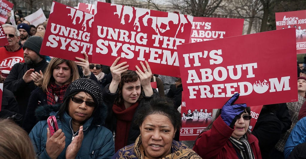 Activists rally in front of the Supreme Court on Feb. 26, 2018 in Washington, D.C. The court was scheduled to hear the case, Janus v. AFSCME, to determine whether states violate their employees' First Amendment rights to require them to join public sector unions which they may not want to associate with. (Photo: Alex Wong/Getty Images)