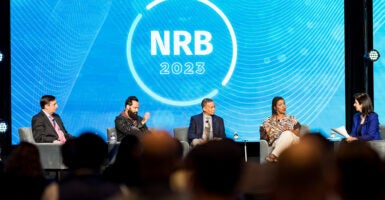National Religious Broadcasters Logo in blue behind five people dressed in suits
