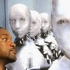 Actor Will Smith poses next to the robot from the movie, "I, Robot."