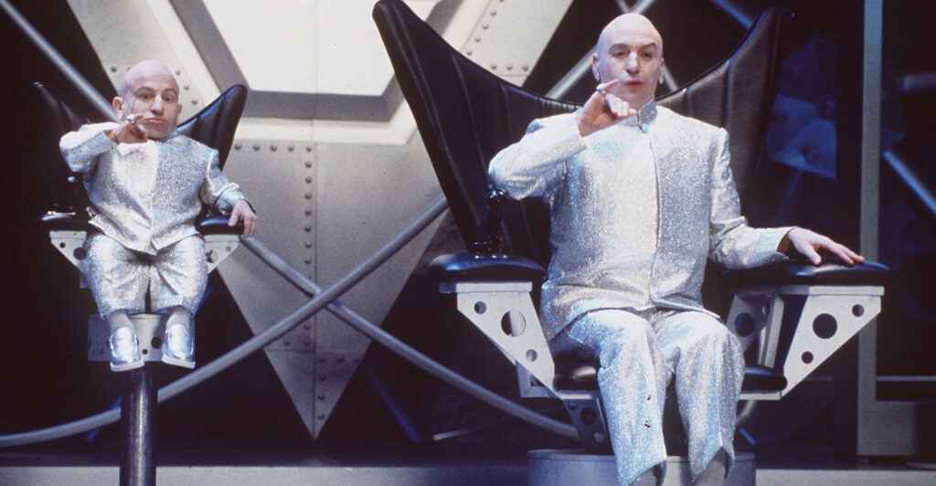 Actors Mike ("Dr. Evil") Meyers (right) and Verne ("Mini-Me") Troyor in a scene from the 1999 comedy film "Austin Powers: The Spy Who Shagged Me."