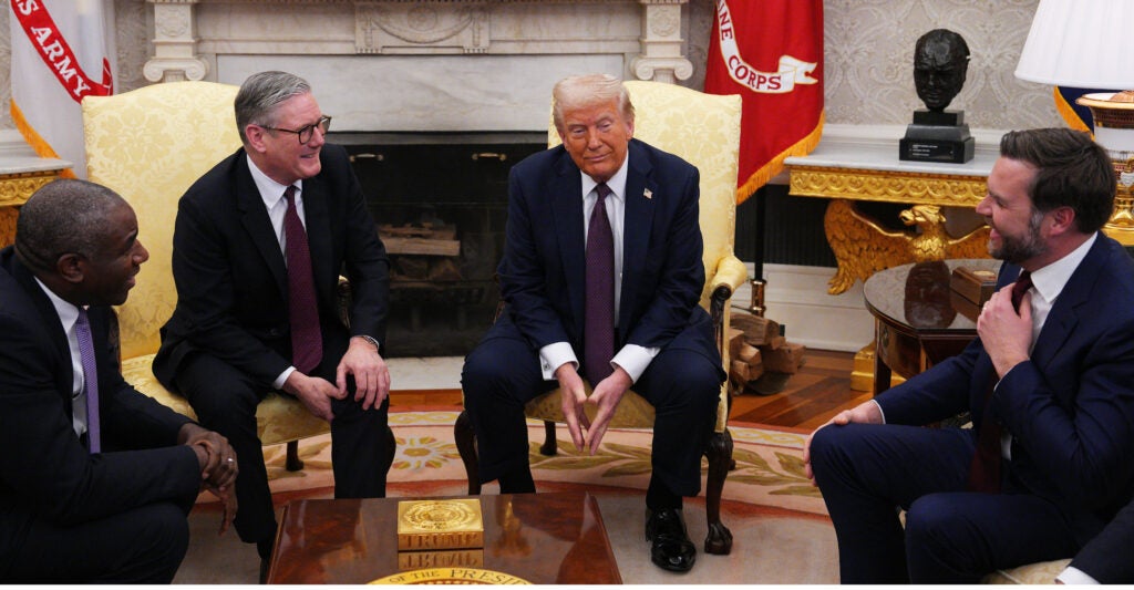 With U.K. Foreign Secretary David Lammy (left) looking on, British Prime Minister Keir Starmer confers with President Donald Trump and Vice President JD Vance at the White House on Thursday.