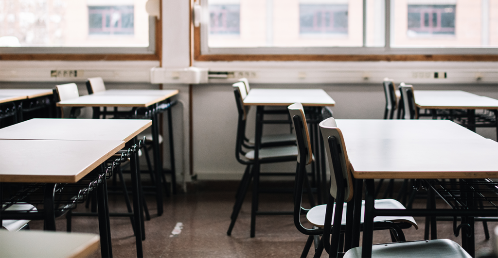 Image shows an empty classroom.