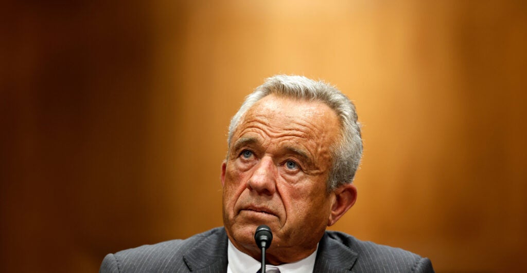 Robert F. Kennedy Jr. wearing a gray suit during his Senate confirmation hearing.