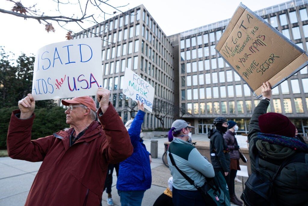 Activists protest to "stop the Musk coup" outside the Office of Personnel Management in Washington on Monday.