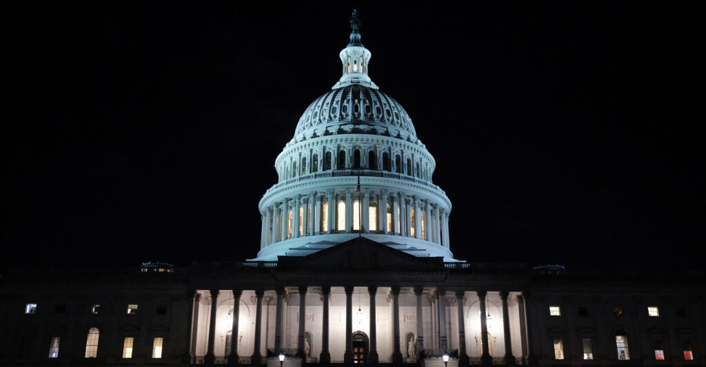 The U.S. Capitol lit up against the night sky