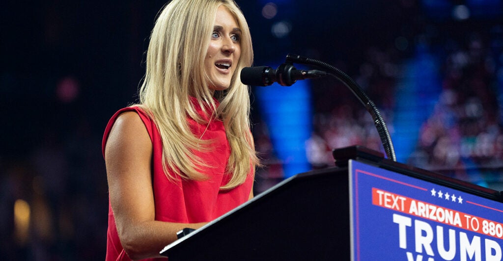 Former collegiate champion swimmer Riley Gaines speaks at an August campaign rally for Donald Trump.