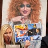 Rep. Marjorie Taylor Greene, R-Ga., speaks at a House subcommittee hearing Wednesday, at which she displayed a photo of a drag queen known as "Lil' Miss Hot Mess."
