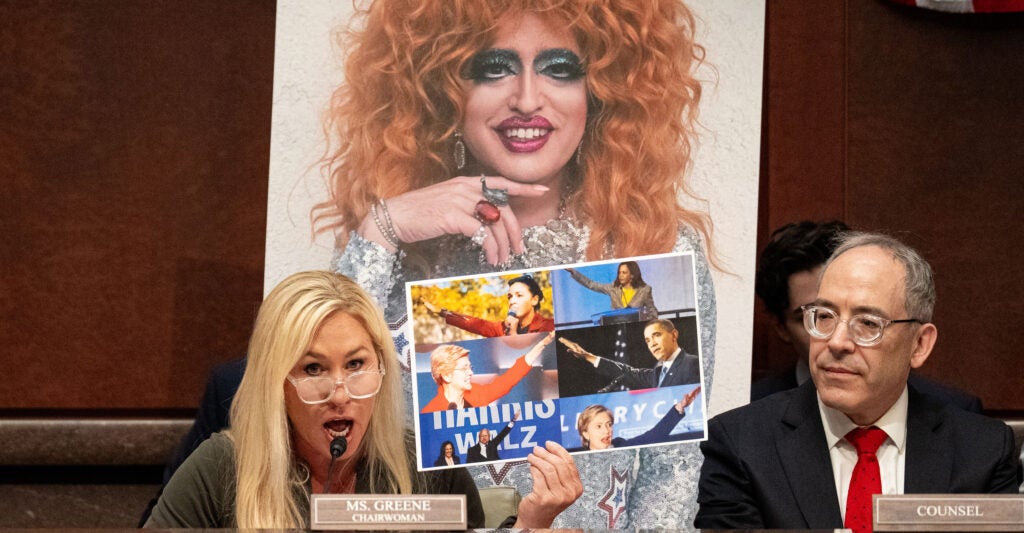 Rep. Marjorie Taylor Greene, R-Ga., speaks at a House subcommittee hearing Wednesday, at which she displayed a photo of a drag queen known as "Lil' Miss Hot Mess."