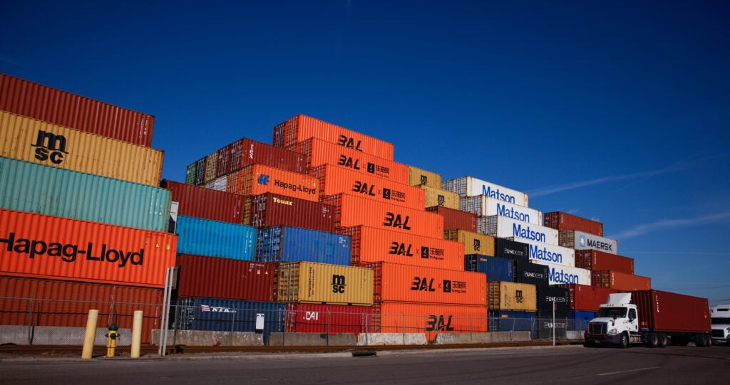 Shipping containers sit at the Port Newark Container Terminal.
