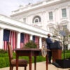 White House staffers prepare for a “Make America Wealthy Again” trade announcement event with President Donald Trump in the Rose Garden at the White House
