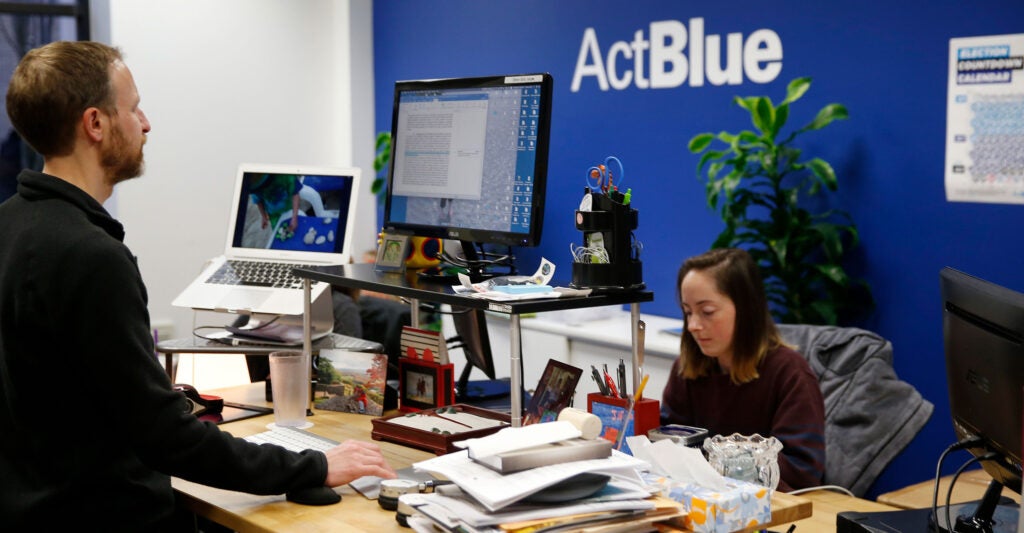 Employees work at ActBlue in Somerville, Mass., on Nov. 13, 2018.