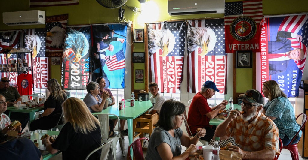 Patrons dine at the Trump Burger restaurant in Bellville, Texas, on April 19. It's one of four such Trump-themed restaurants in Texas, but it's not linked to the Trump Organization.