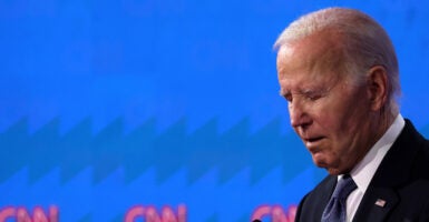 Former President Joe Biden, in profile, looking down during 2024 CNN debate.