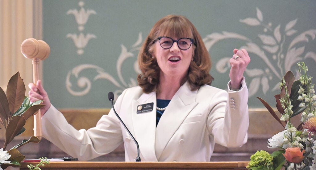 Julie McCluskie in white