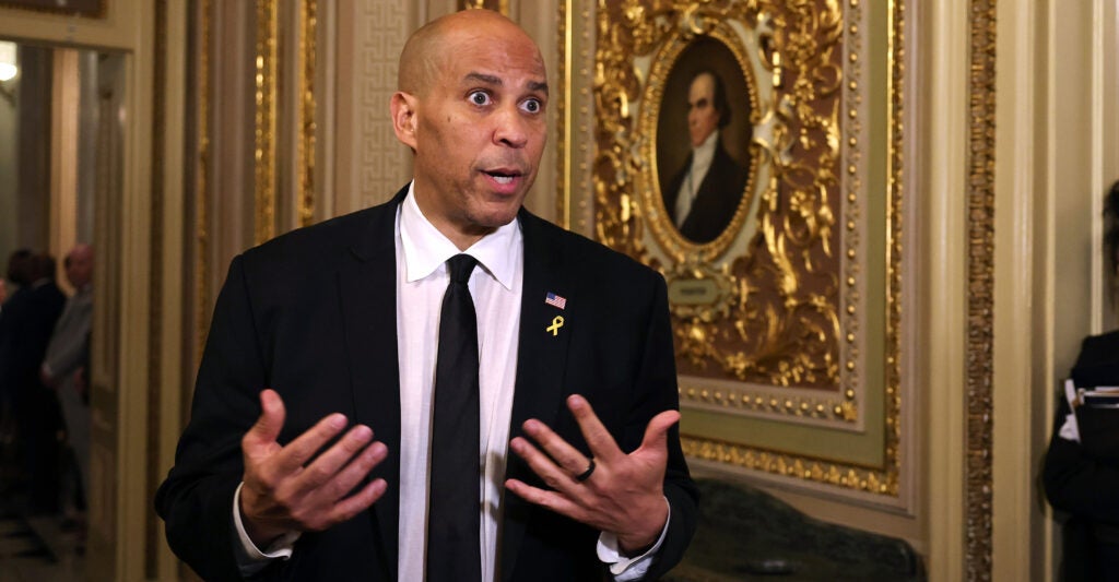 Sen. Cory Booker, D-N.J., speaks to reporters after delivering a record-long floor speech on March 31 and April 1.