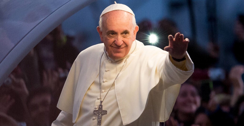 Pope Francis waving.