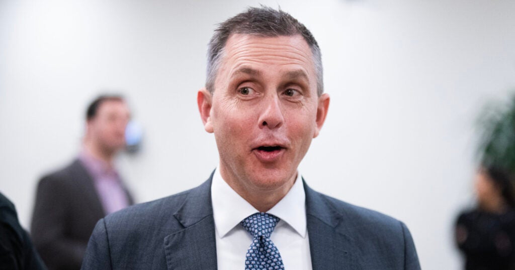 Close up of a wide-eyed North Dakota Gov. Kelly Armstrong.