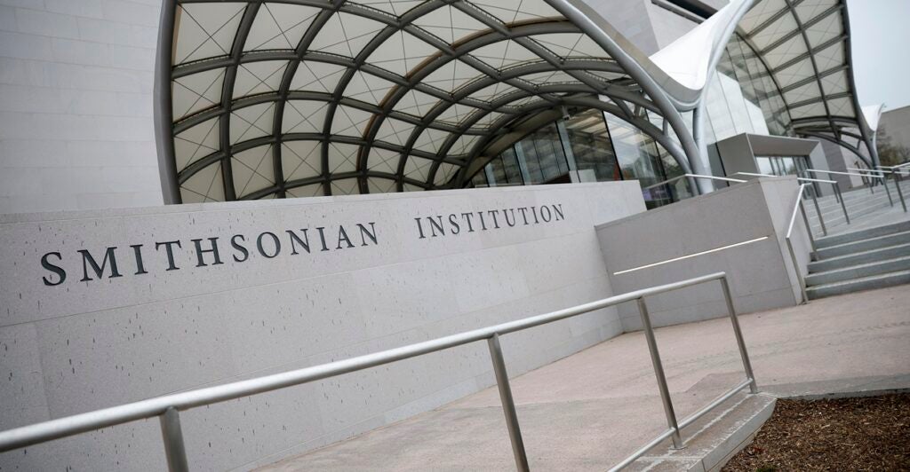 A Smithsonian Institution sign is seen on the National Air and Space Museum on the National Mall.