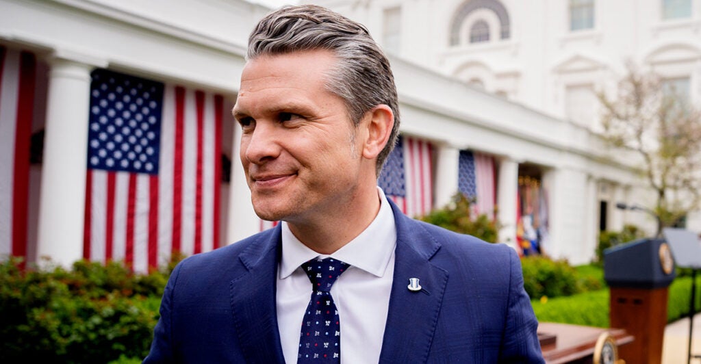 Defense Secretary Pete Hegseth leaves the White House.