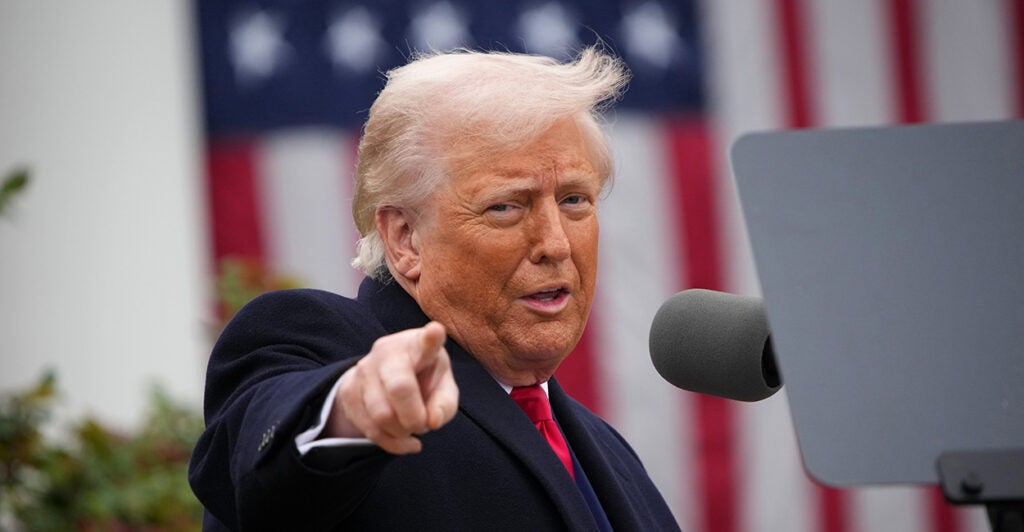 Trump points at the camera