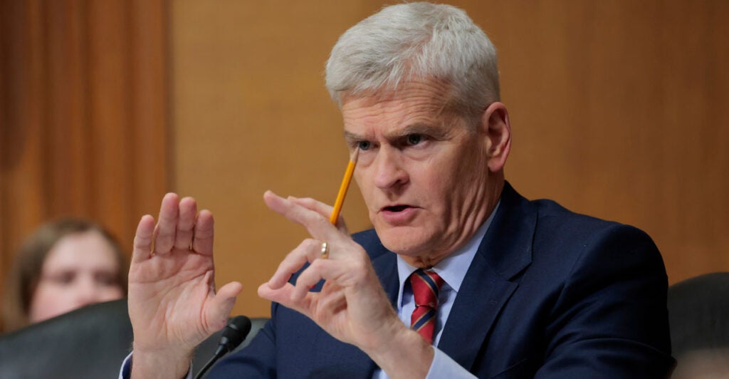 Sen. Bill Cassidy, R-La., gestures during a Senate committee hearing on March 14.