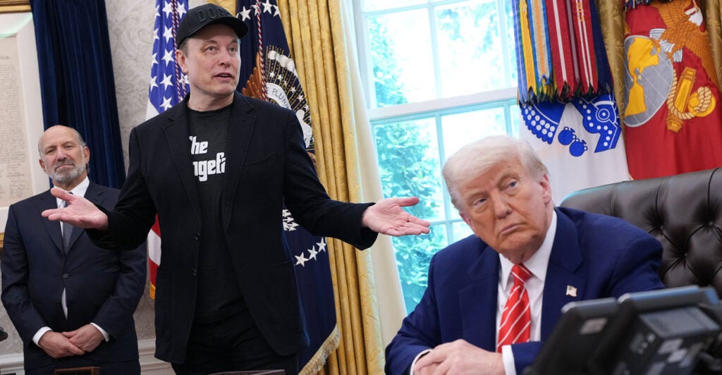 With Commerce Secretary Howard Lutnick (left) looking on, Tesla CEO Elon Musk joins President Donald Trump in the Oval Office of the White House on Friday.