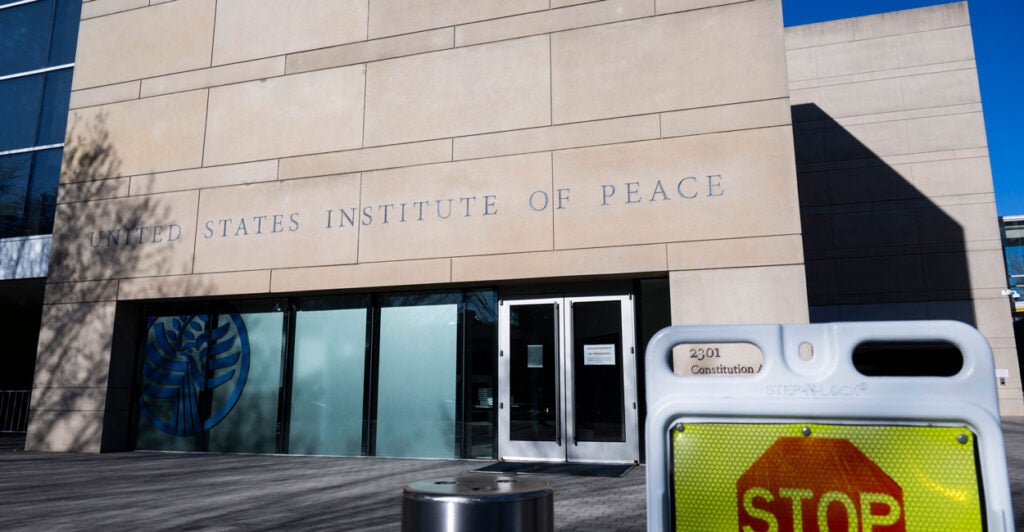 A stop sign stands outside the U.S. Institute of Peace in Washington, D.C.