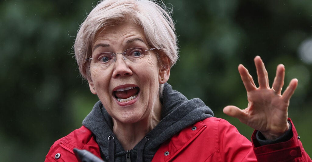 Sen. Elizabeth Warren, D-Mass., speaks at a Capitol Hill rally on May 21.