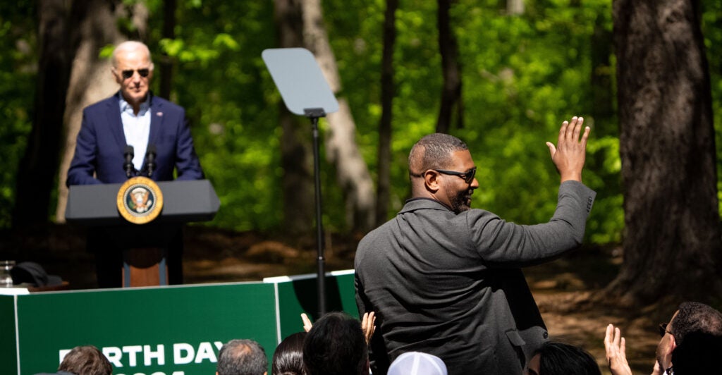 Biden recognizes his EPA adminstrator while speaking at Earth Day.