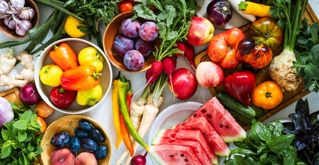 An overhead shot of a load of fruits and vegetables.