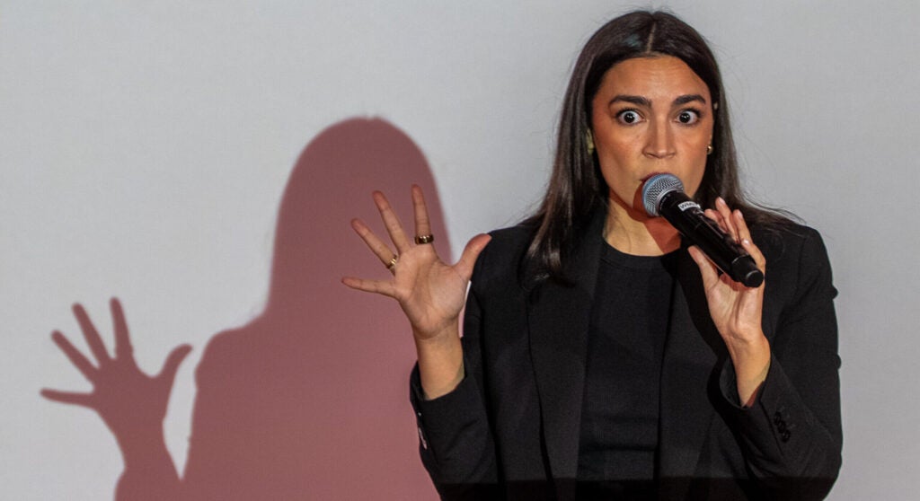 Rep. Alexandria Ocasio-Cortez and her shadow against a white background.