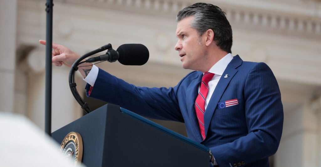 Defense Secretary Pete Hegseth speaks at Arlington National Cemetery on Monday.