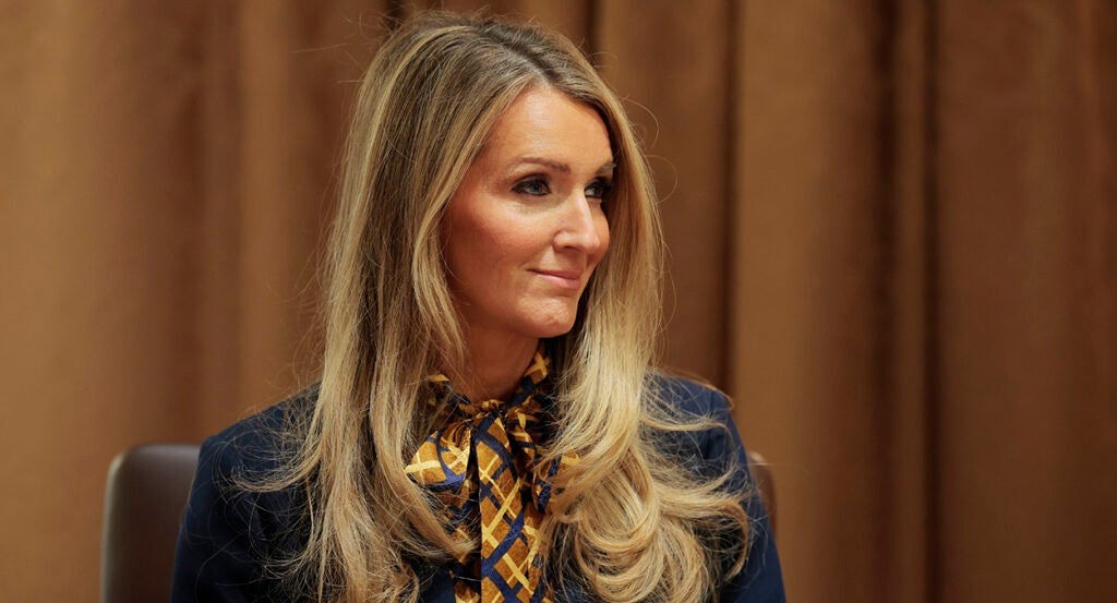 Kelly Loeffler with a checkered scarf