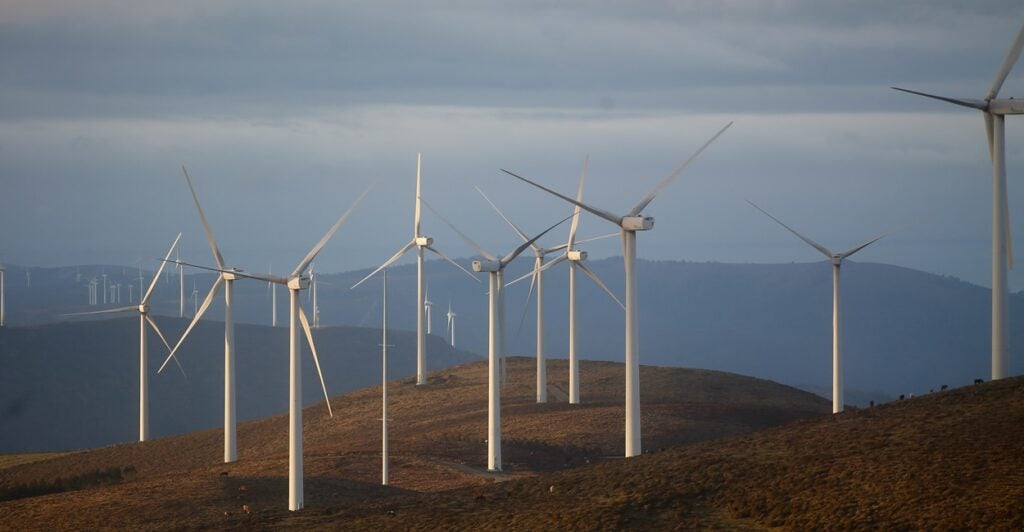 A windmill farm in Spain dominates the landscape.