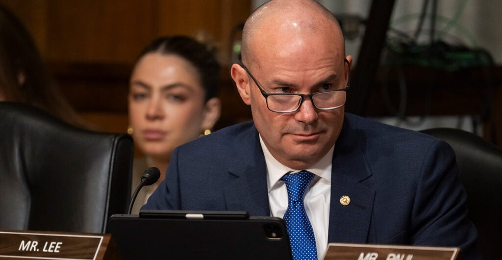 Sen. Mike Lee, R-Utah, listens during a committee hearing.