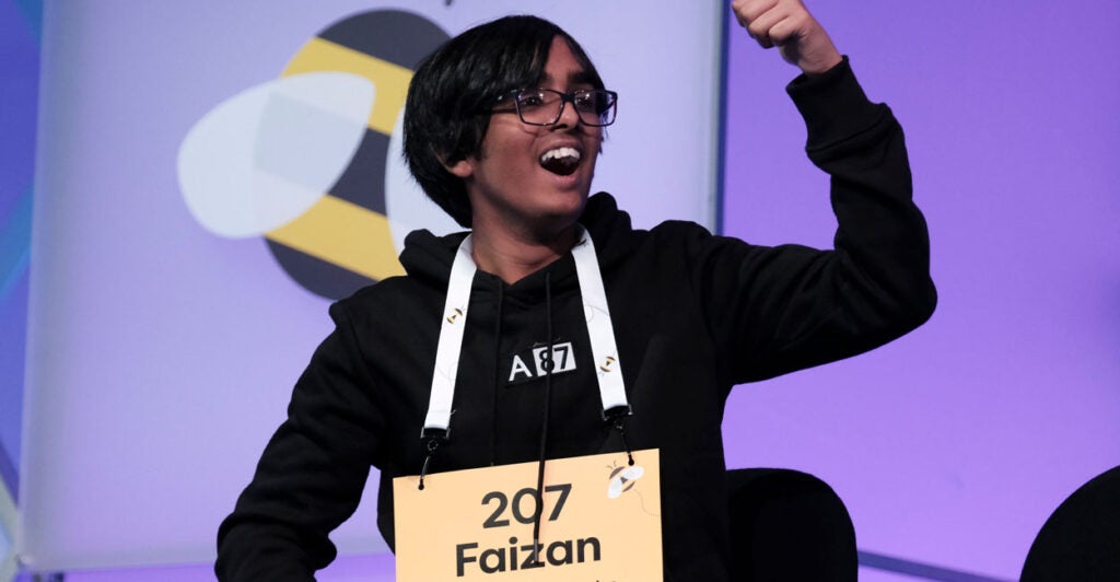 Faizan Zaki, 13, exults after winning the 2025 Scripps National Spelling Bee on Thursday night in National Harbor, Maryland.