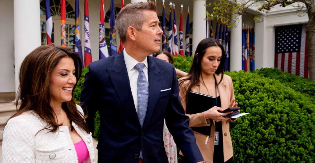 Transportation Secretary Sean Duffy and his wife, Rachel Campos-Duffy (left), are seen here in the Rose Garden of the White House on April 2.