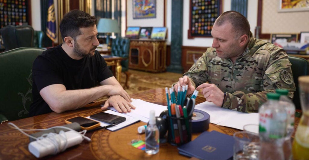 Ukrainian President Volodymyr Zelenskyy (left) confers with the head of the Security Service of Ukraine, Vasyl Malyuk, in Kyiv, Ukraine, on Sunday.
