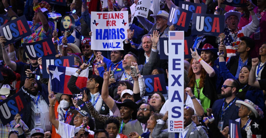 Texas delegates cheer at the Democratic National Convention in Chicago on Aug. 20, 2024.