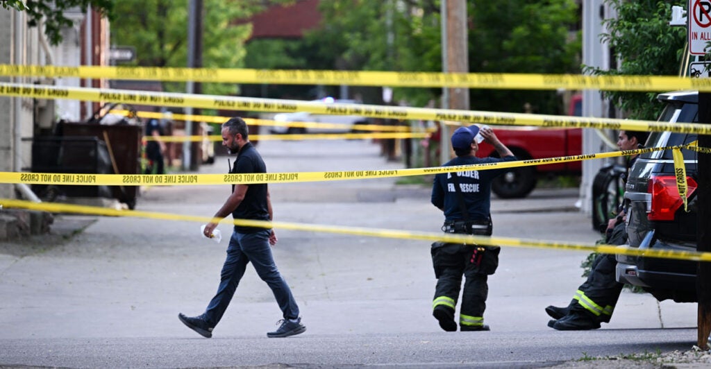 Yellow police crime-scene tape marks the scene of an attack in Boulder, Colorado, on Sunday.
