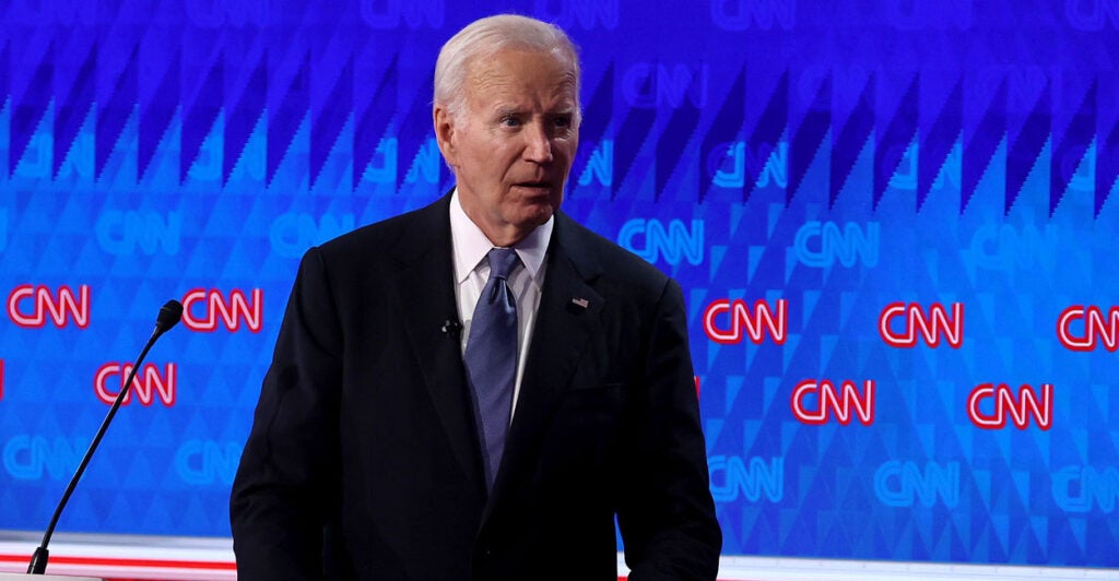 A dazed Joe Biden departs the stage at his 2024 presidential debate with Donald Trump on CNN.