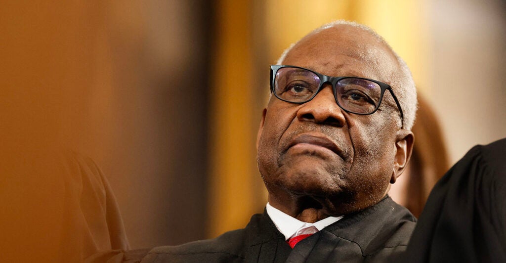 Clarence Thomas scowls