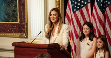 PragerU CEO Marissa Streit at the White House wearing white.