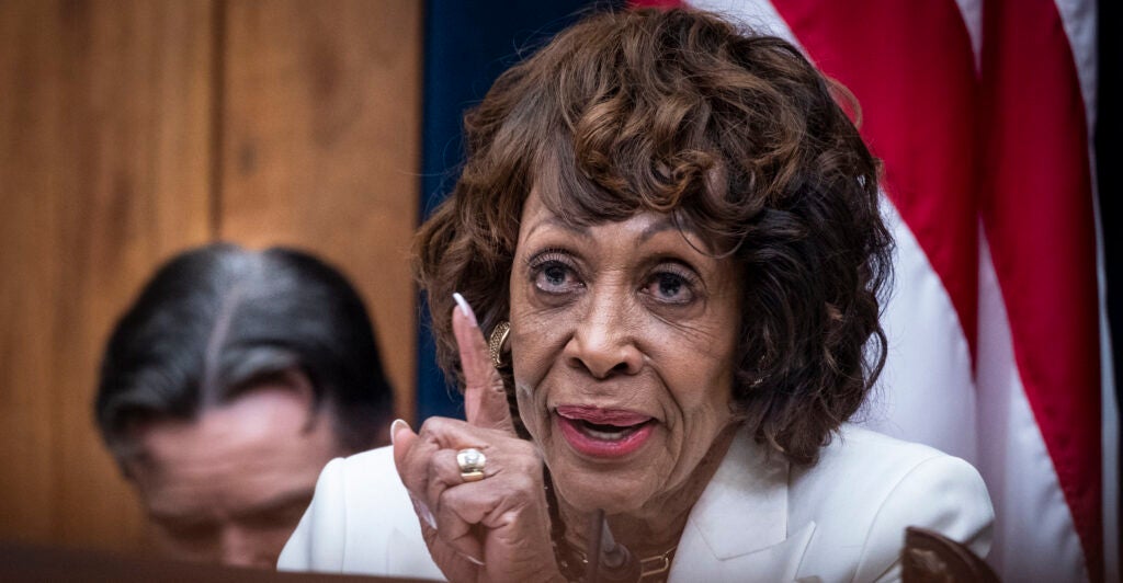 Rep. Maxine Waters, D-Calif., wags a finger at someone.