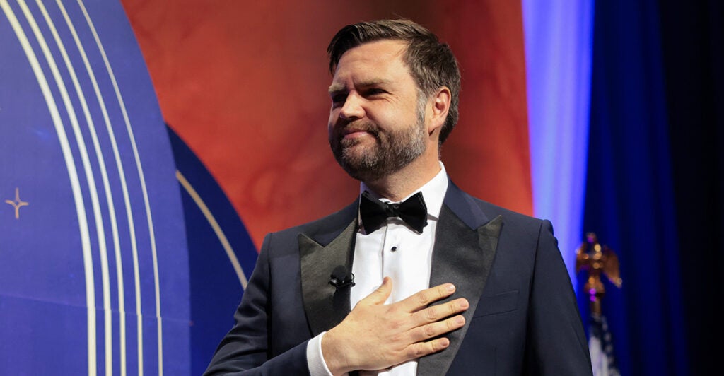 Vice President JD Vance in a tuxedo with his right hand on his chest