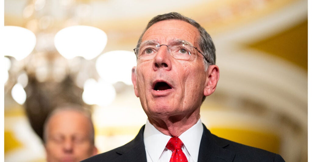 Sen. John Barrasso, R-Wyo., speaks to reporters on April 29.