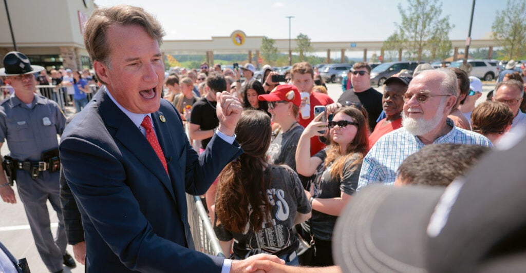 Virginia Gov. Glenn Youngkin greets the public at the grand opening of the first Buc-ees in the state.
